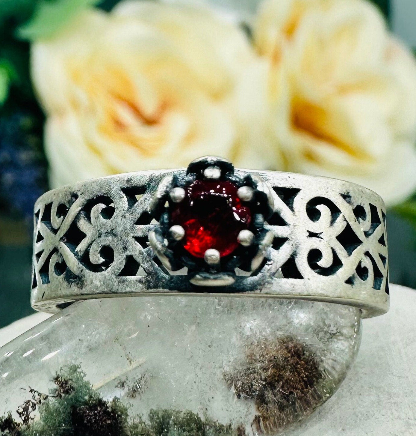 Gemstone keepsake ring made with lock of hair. Band is an absolutely breathtaking patterned design with a thickness of 5mm. Gemstone is a round cut 4mm made in chosen colour.